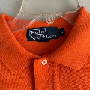 Polo Shirt Men’s Size Medium Orange in color pre owned Size 20” x 28”